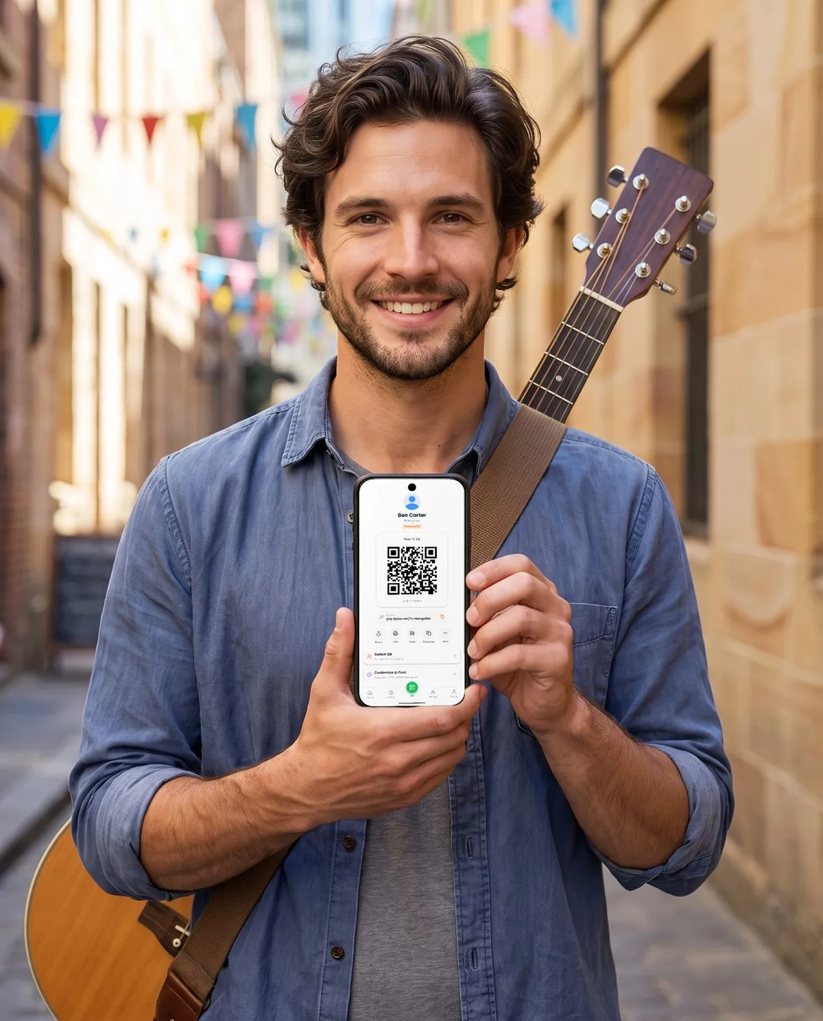 A musician holding a phone that shows his QR code for tips